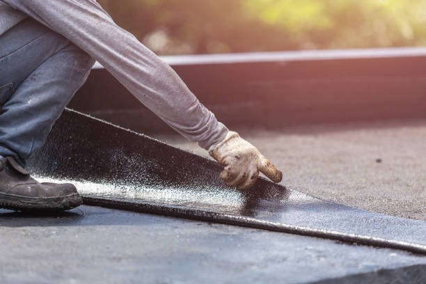 Professional Waterproofing technician working in Westport, WA